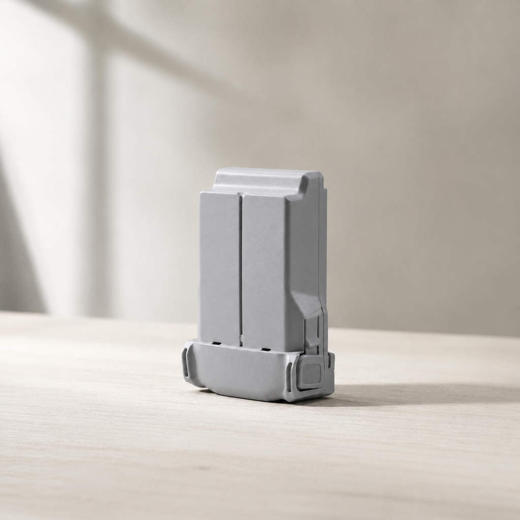Mini 3 family battery on wood, window light